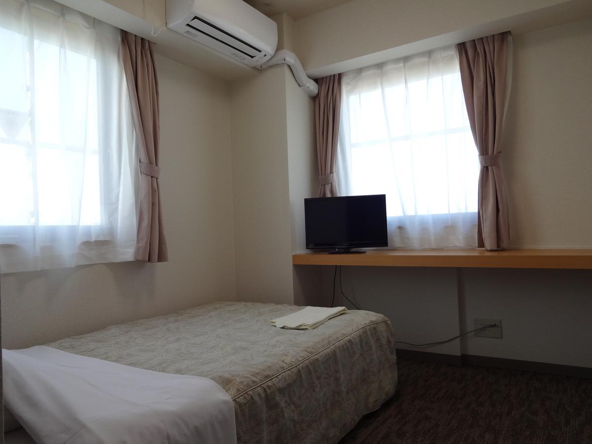 Ushiku City Hotel Ekimaekan Esterno foto
