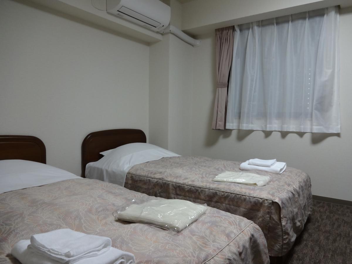 Ushiku City Hotel Ekimaekan Esterno foto