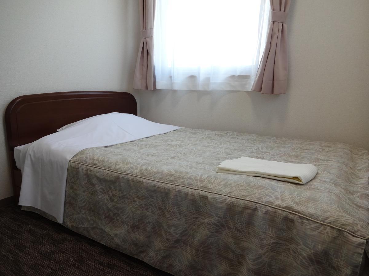 Ushiku City Hotel Ekimaekan Esterno foto