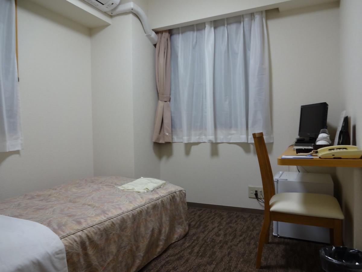 Ushiku City Hotel Ekimaekan Esterno foto