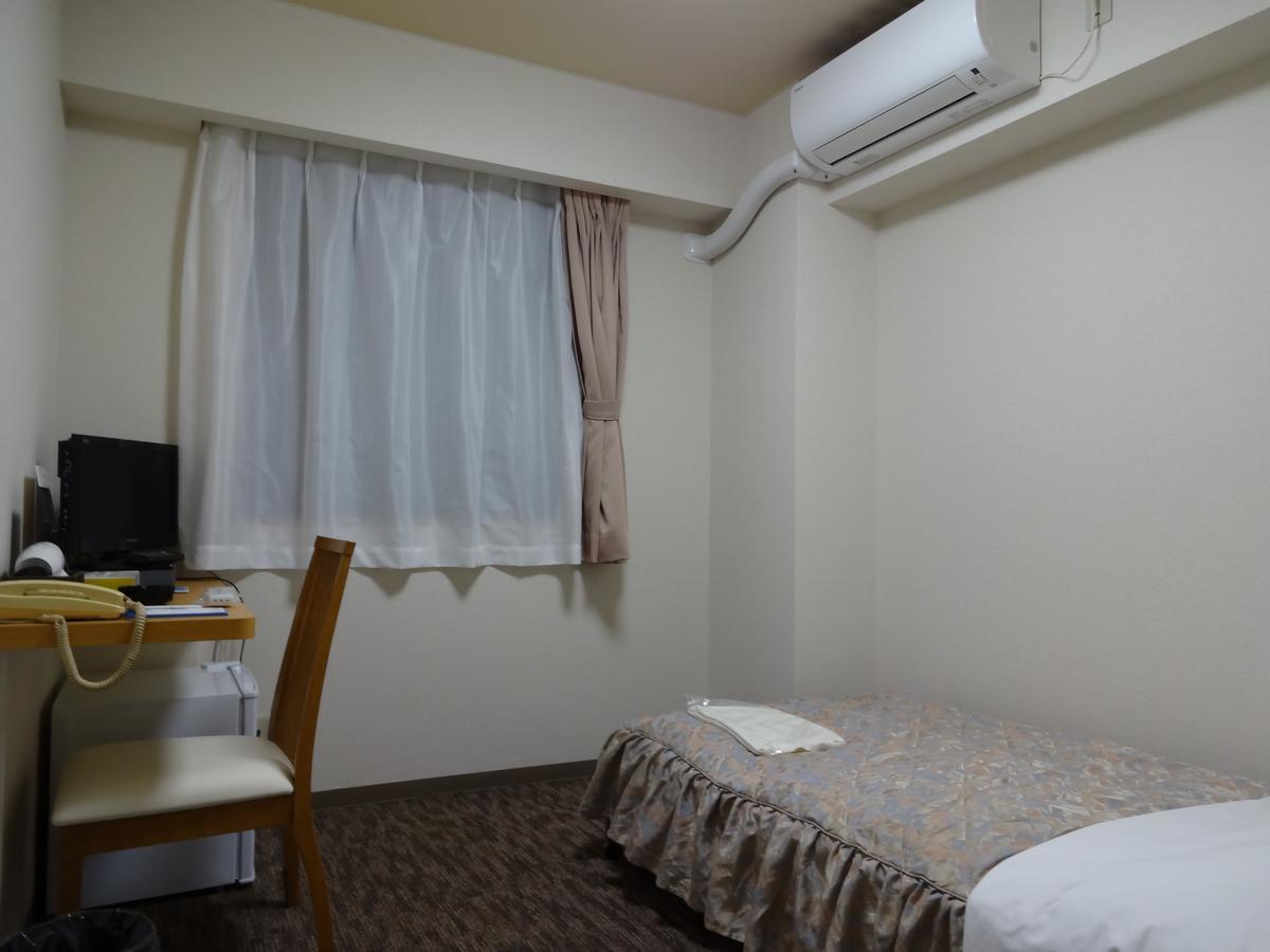 Ushiku City Hotel Ekimaekan Esterno foto